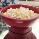 Nordic Ware Microwave Popcorn Popper is a popper, but can also act as a Tupperware to keep your snack fresh.